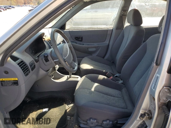 2005 Hyundai Accent GLS with VIN KMHCG45C75U638812, listed as a Copart auction lot 77968234 with 130,815 mi miles and Salvage Title. Bid and sale history available at carsss.com. Image 7.