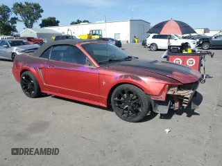 2002 Ford Mustang Deluxe with VIN 1FAFP44462F174929, listed as a Copart auction lot 61975925 with 110,825 mi miles and Salvage title. Bid and sale history available at DreamBid. Image 4.