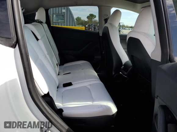 2023 Tesla Model Y Long Range with VIN 7SAYGAEE6PF795434, listed as a Copart auction lot 67507984 with 24,469 mi miles and Salvage Title. Bid and sale history available at DreamBid. Image 10.