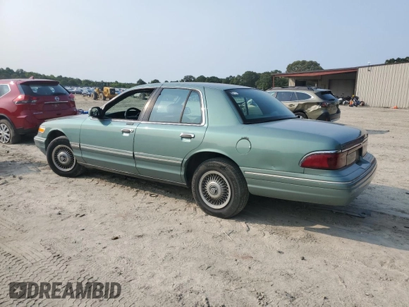1997 Mercury Grand Marquis GS z VIN 2MELM74W2VX663313, wystawiony jako Copart lot #59539665 z przebiegiem 260 024 mil mil oraz Czysty tytuł • Clean title. Historia ofert i sprzedaży dostępna na DreamBid. Obrazek 2.