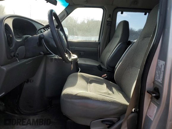 2004 Ford Econoline Passenger XL with VIN 1FMRE11W54HB15178, listed as a Copart auction lot 83088104 with 248,516 mi miles and Salvage Title. Bid and sale history available at DreamBid. Image 7.