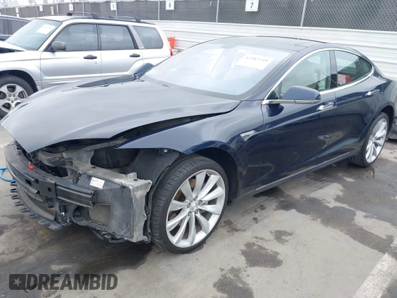 2014 Tesla Model S 60 with VIN 5YJSA1H10EFP30234, listed as a IAAI auction lot 42182249 with 186,654 mi miles and . Bid and sale history available at DreamBid. Image 2.