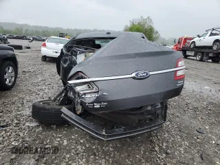 2017 Ford Taurus SEL z VIN 1FAHP2E88HG106391, wystawiony jako Copart lot #55289375 z przebiegiem 66 901 mil mil oraz Szkoda całkowita • Salvage title. Historia ofert i sprzedaży dostępna na DreamBid. Obrazek 6.