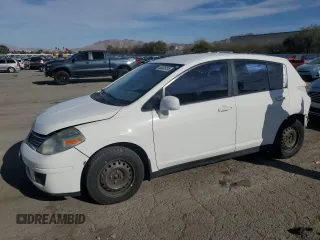 2009 Nissan Versa 1.8 S with VIN 3N1BC13E39L354109, listed as a Copart auction lot 50328135 with 133,257 mi miles and Salvage Title. Bid and sale history available at carsss.com. Image 1.