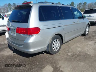 2008 Honda Odyssey EX-L with VIN 5FNRL38708B110657, listed as a IAAI auction lot 41854985 with 253,985 mi miles and . Bid and sale history available at carsss.com. Image 4.