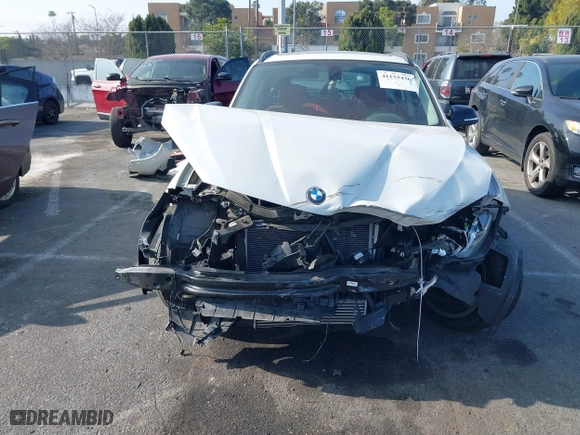2014 BMW X1 xDrive28i with VIN WBAVL1C52EVY23658, listed as a IAAI auction lot 41153436 with 26,791 mi miles. Bid and sale history available at carsss.com. Image 13.