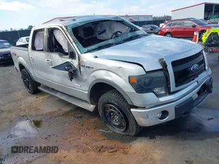 2014 Ford F-150 XL with VIN 1FTFW1ETXEKG43484, listed as a IAAI auction lot 41677184 with 201,991 mi miles. Bid and sale history available at carsss.com. Image 1.