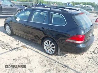 2013 Volkswagen Jetta SportWagen TDI with VIN 3VWPL7AJ6DM695011, listed as a IAAI auction lot 42129066 with 194,310 mi miles. Bid and sale history available at carsss.com. Image 3.