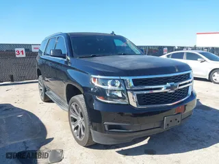 2015 Chevrolet Tahoe LT with VIN 1GNSCBKC2FR704344, listed as a IAAI auction lot 42087836 with 163,301 mi miles. Bid and sale history available at carsss.com. Image 1.