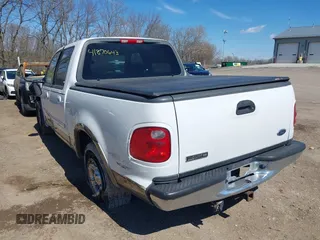 2003 Ford F-150 XLT with VIN 1FTRW07663KD57580, listed as a IAAI auction lot 41870643 with 256,497 mi miles. Bid and sale history available at carsss.com. Image 3.