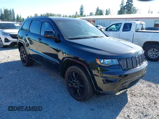 2018 Jeep Grand Cherokee Laredo E with VIN 1C4RJFAG6JC106066, listed as a IAAI auction lot 42433285 with 61,611 mi miles and . Bid and sale history available at DreamBid. Image 1.