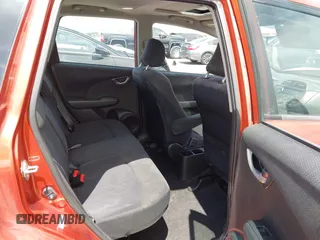 2012 Honda Fit Sport z VIN JHMGE8H57CC042178, wystawiony jako IAAI lot #42353989 z przebiegiem 115 911 mil mil oraz . Historia ofert i sprzedaży dostępna na DreamBid. Obrazek 8.