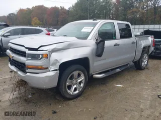 2018 Chevrolet Silverado 1500 Custom with VIN 3GCUKPEC6JG158864, listed as a IAAI auction lot 40902459 with 154,701 mi miles. Bid and sale history available at carsss.com. Image 2.
