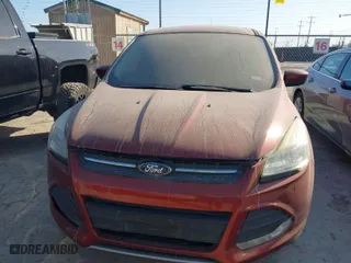 2015 Ford Escape SE with VIN 1FMCU0G73FUC61608, listed as a IAAI auction lot 41993701 with 116,113 mi miles. Bid and sale history available at carsss.com. Image 6.