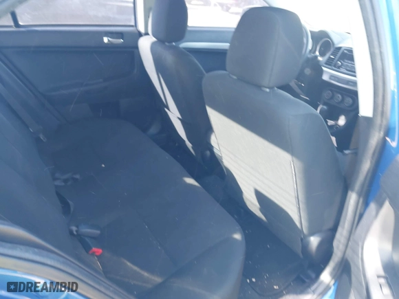 2015 Mitsubishi Lancer ES with VIN JA32U2FU0FU012412, listed as a IAAI auction lot 41766999 with 158,851 mi miles. Bid and sale history available at carsss.com. Image 8.