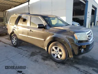 2010 Honda Pilot Touring with VIN 5FNYF3H83AB020730, listed as a Copart auction lot 84697994 with 238,329 mi miles and Salvage Title. Bid and sale history available at DreamBid. Image 4.