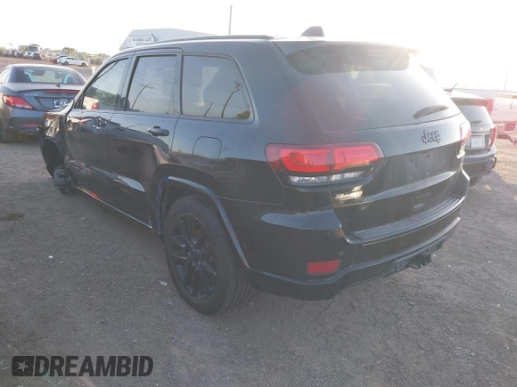 2017 Jeep Grand Cherokee Altitude with VIN 1C4RJEAG3HC854343, listed as a IAAI auction lot 42519303 with 136,721 mi miles and . Bid and sale history available at DreamBid. Image 3.