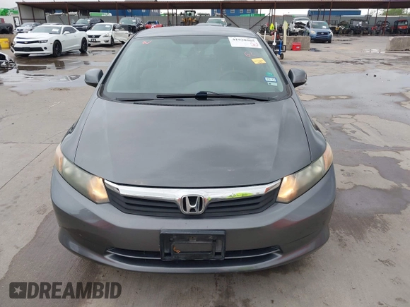 2012 Honda Civic LX z VIN 2HGFB2F51CH600546, wystawiony jako IAAI lot #41920265 z przebiegiem 196 599 mil mil oraz . Historia ofert i sprzedaży dostępna na DreamBid. Obrazek 12.