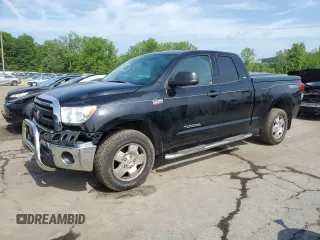 2012 Toyota Tundra z VIN 5TFUY5F10CX236098, wystawiony jako Copart lot #57401165 z przebiegiem 218 993 mil mil oraz Szkoda całkowita • Salvage title. Historia ofert i sprzedaży dostępna na DreamBid. Obrazek 1.