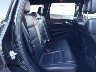 2014 Jeep Grand Cherokee Limited z VIN 1C4RJFBG0EC302024, wystawiony jako IAAI lot #41830163 z przebiegiem 159 282 mil mil oraz . Historia ofert i sprzedaży dostępna na DreamBid. Obrazek 8.