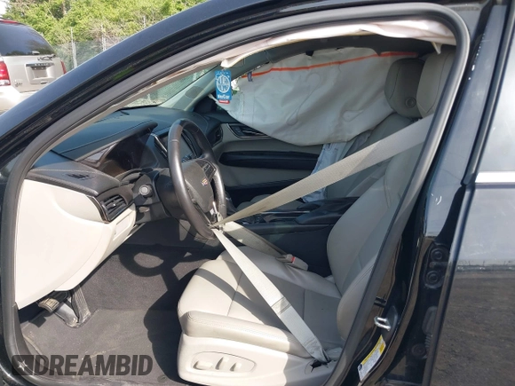 2016 Cadillac ATS Standard RWD with VIN 1G6AA5RA6G0196081, listed as a IAAI auction lot 42140830 with 84,700 mi miles and . Bid and sale history available at DreamBid. Image 5.