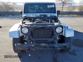 2007 Jeep Wrangler Unlimited Sahara with VIN 1J4GB59197L144781, listed as a Copart auction lot 48678315 with 137,538 mi miles and Salvage title. Bid and sale history available at DreamBid. Image 5.