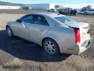 2009 Cadillac CTS AWD w/1SB with VIN 1G6DT57V990107958, listed as a IAAI auction lot 41685415 with 148,294 mi miles. Bid and sale history available at carsss.com. Image 3.