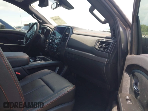 2024 Nissan Titan Pro-4X with VIN 1N6AA1ED8RN114313, listed as a IAAI auction lot 42498591 with 21,955 mi miles and . Bid and sale history available at DreamBid. Image 5.