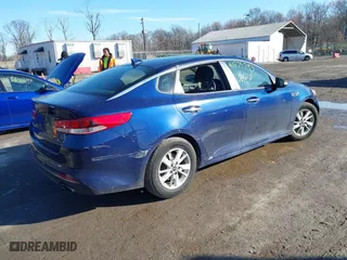 2018 Kia Optima LX with VIN 5XXGT4L33JG191559, listed as a IAAI auction lot 41875793 with 152,479 mi miles. Bid and sale history available at carsss.com. Image 4.