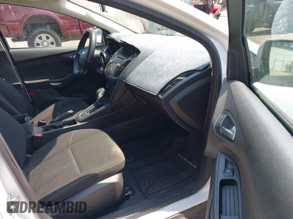 2016 Ford Focus SE z VIN 1FADP3F24GL268619, wystawiony jako IAAI lot #42750298 z przebiegiem 96 587 mil mil oraz . Historia ofert i sprzedaży dostępna na DreamBid. Obrazek 5.
