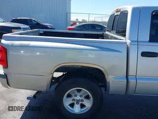 2008 Dodge Dakota SLT with VIN 1D7HE48K78S514290, listed as a IAAI auction lot 41766396 with 208,744 mi miles and . Bid and sale history available at carsss.com. Image 6.