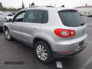 2011 Volkswagen Tiguan SEL w/Premium Navi with VIN WVGAV7AX7BW547613, listed as a IAAI auction lot 41916574 with 140,385 mi miles and . Bid and sale history available at DreamBid. Image 3.