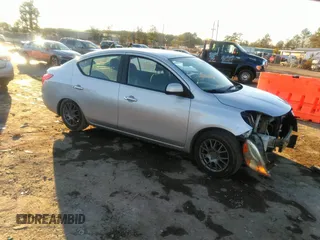 2012 Nissan Versa SV with VIN 3N1CN7AP4CL879273, listed as a IAAI auction lot 41316515 with 104,147 mi miles. Bid and sale history available at carsss.com. Image 1.