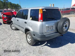 1999 Honda CR-V LX with VIN JHLRD1841XC027566, listed as a IAAI auction lot 41838889 with 213,139 mi miles. Bid and sale history available at carsss.com. Image 3.