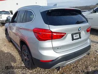 2019 BMW X1 sDrive28i with VIN WBXHU7C52K3H44360, listed as a IAAI auction lot 41709431 with 56,432 mi miles. Bid and sale history available at carsss.com. Image 3.
