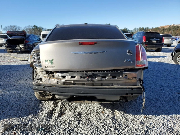 2014 Chrysler 300 C z VIN 2C3CCAEG9EH328699, wystawiony jako Copart lot #88137275 z przebiegiem 132 555 mil mil oraz Szkoda całkowita • Salvage title. Historia ofert i sprzedaży dostępna na DreamBid. Obrazek 6.