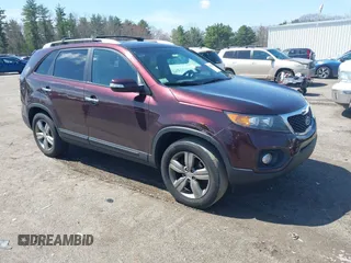 2012 Kia Sorento EX with VIN 5XYKU3A65CG299100, listed as a IAAI auction lot 42098445 with 172,203 mi miles. Bid and sale history available at carsss.com. Image 1.