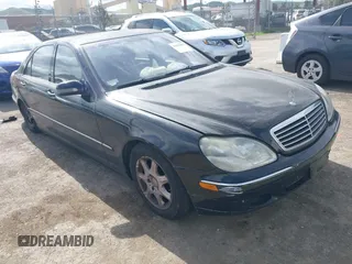 2001 Mercedes-Benz S with VIN WDBNG70J21A155758, listed as a IAAI auction lot 41659000 with 240,920 mi miles. Bid and sale history available at carsss.com. Image 1.