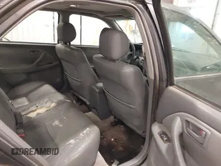 2001 Toyota Camry LE z VIN JT2BF28K110307972, wystawiony jako IAAI lot #41652522 z przebiegiem 201 631 mil mil oraz . Historia ofert i sprzedaży dostępna na DreamBid. Obrazek 8.