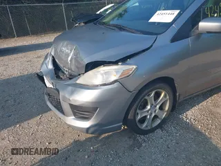 2010 Mazda 5 Sport with VIN JM1CR2W32A0385045, listed as a IAAI auction lot 42451448 with 127,762 mi miles and . Bid and sale history available at DreamBid. Image 18.