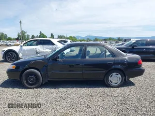 1999 Toyota Corolla VE z VIN 1NXBR12E9XZ205120, wystawiony jako IAAI lot #42216177 z przebiegiem 175 508 mil mil oraz . Historia ofert i sprzedaży dostępna na DreamBid. Obrazek 14.