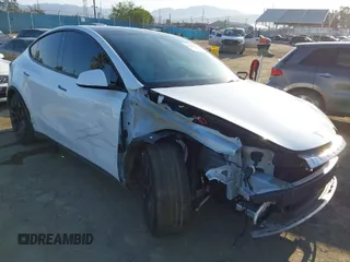 2022 Tesla Model Y Performance z VIN 7SAYGDEF8NF404002, wystawiony jako IAAI lot #41788713 z przebiegiem 39 135 mil mil oraz . Historia ofert i sprzedaży dostępna na DreamBid. Obrazek 1.