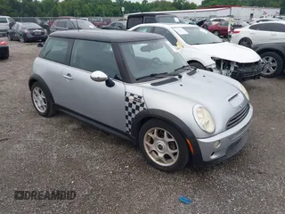 2006 MINI Hardtop S with VIN WMWRE33556TJ37120, listed as a IAAI auction lot 42601923 with 51,501 mi miles and . Bid and sale history available at DreamBid. Image 1.