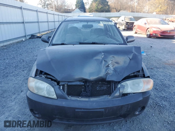 2003 Kia Spectra with VIN KNAFB121235248271, listed as a Copart auction lot 82426614 with 151,347 mi miles and Salvage Title. Bid and sale history available at DreamBid. Image 5.