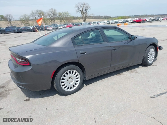 2020 Dodge Charger Police with VIN 2C3CDXKT3LH112023, listed as a IAAI auction lot 42124903 with 130,738 mi miles. Bid and sale history available at carsss.com. Image 4.