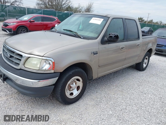 2001 Ford F-150 XLT with VIN 1FTRW07W01KB64001, listed as a IAAI auction lot 41903682 with 175,396 mi miles and . Bid and sale history available at DreamBid. Image 2.