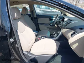2014 Hyundai Elantra SE with VIN KMHDH4AE5EU101798, listed as a IAAI auction lot 41785753 with 206,799 mi miles. Bid and sale history available at carsss.com. Image 5.