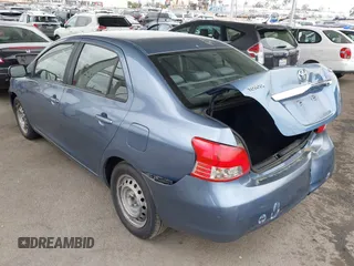 2009 Toyota Yaris with VIN JTDBT903791302911, listed as a IAAI auction lot 42181264 with 183,321 mi miles. Bid and sale history available at carsss.com. Image 3.