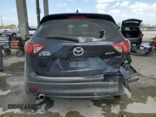 2016 Mazda CX-5 Touring with VIN JM3KE2CY9G0834048, listed as a Copart auction lot 54491535 with 116,328 mi miles and Salvage Title. Bid and sale history available at DreamBid. Image 6.