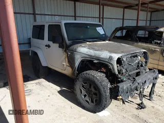2015 Jeep Wrangler Altitude z VIN 1C4GJWBG2FL714146, wystawiony jako IAAI lot #41417659 z przebiegiem Nie podano mil oraz . Historia ofert i sprzedaży dostępna na DreamBid. Obrazek 1.